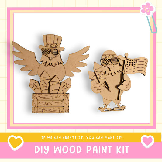 two wooden owl figures, one with wings spread and the other holding an American flag, both wearing sunglasses and hats, set against a pink and white background.
