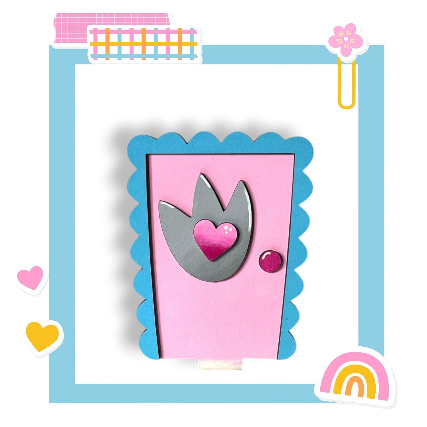 a picture of a pink door with a heart on it