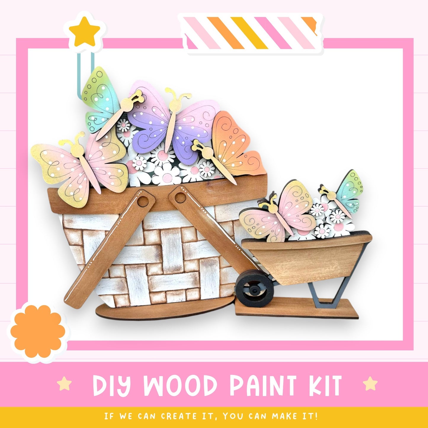 The image is a colorful and whimsical DIY wood paint kit featuring a basket filled with butterflies and flowers, along with a wooden wheelbarrow. The kit appears to be designed for children to create their own wooden artwork.