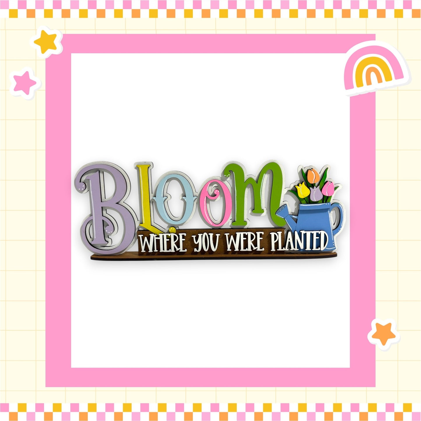 a colorful sign with the text "Bloom" and "Where you were planted" written on it.