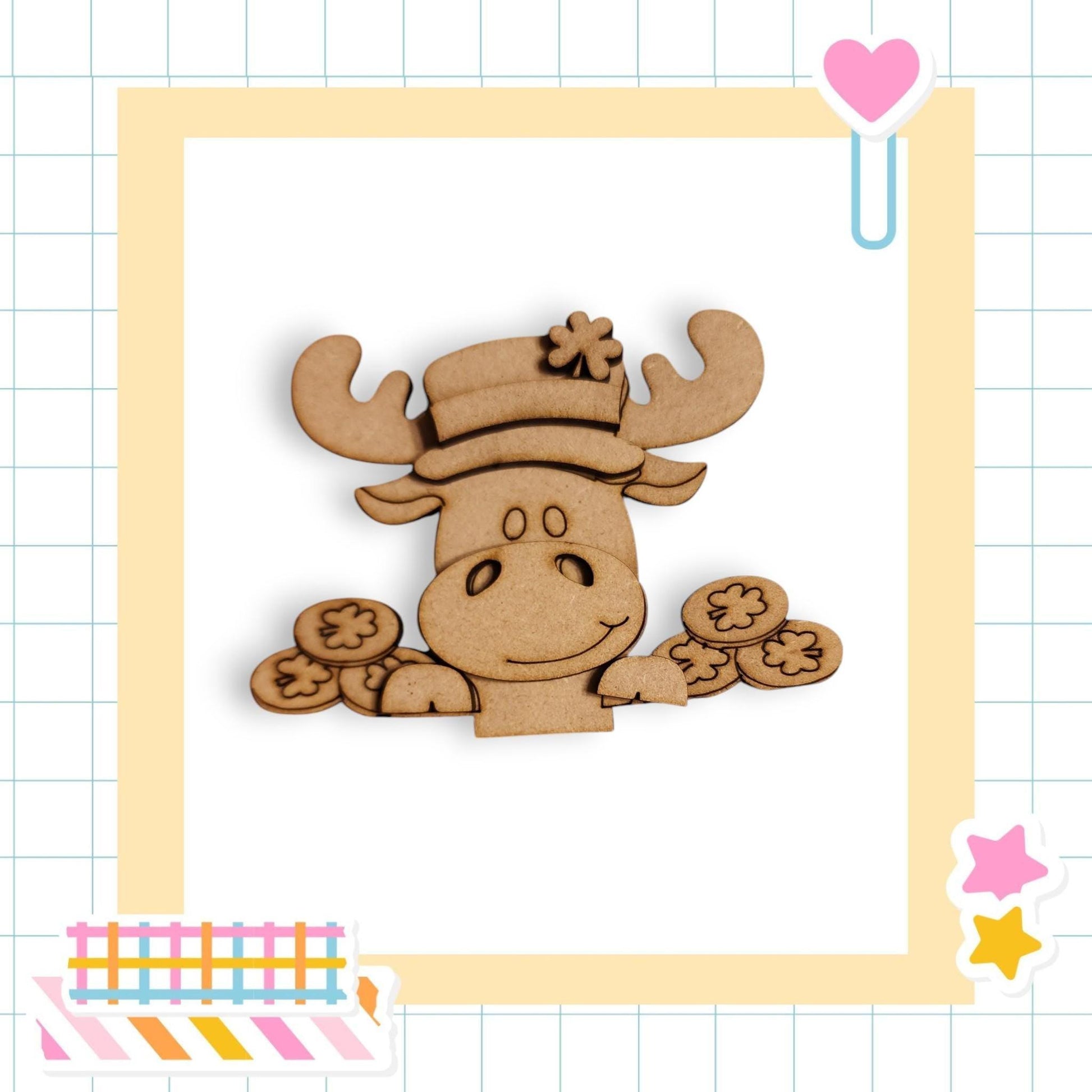 a wooden cutout of a moose with cookies