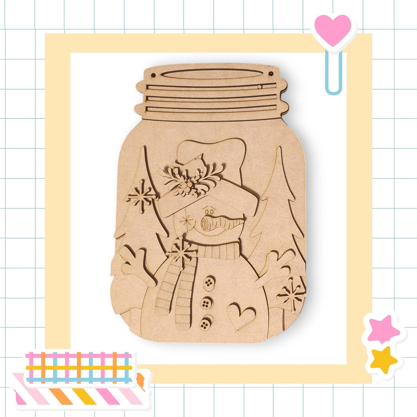 A wooden snowman figure is displayed in a mason jar, surrounded by various colorful stickers and a heart-shaped object.