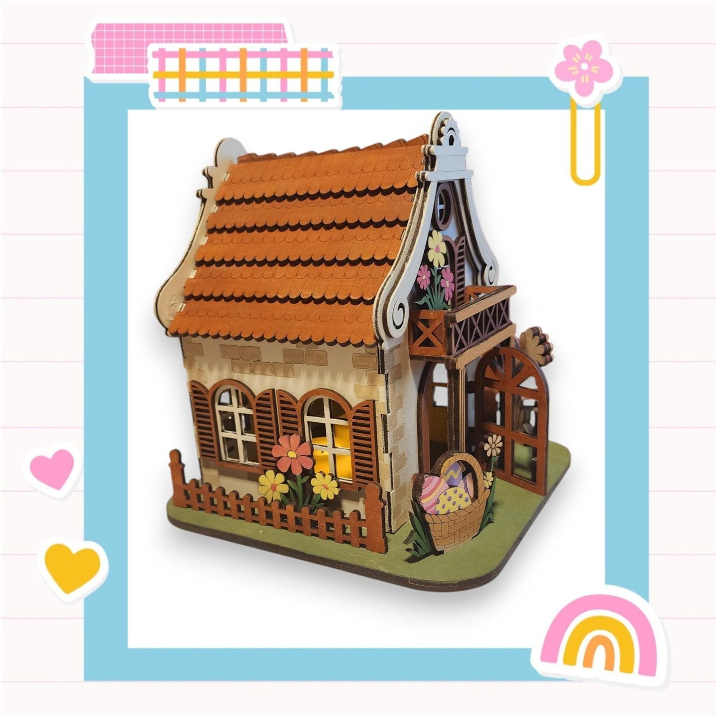 a small wooden house with a red roof