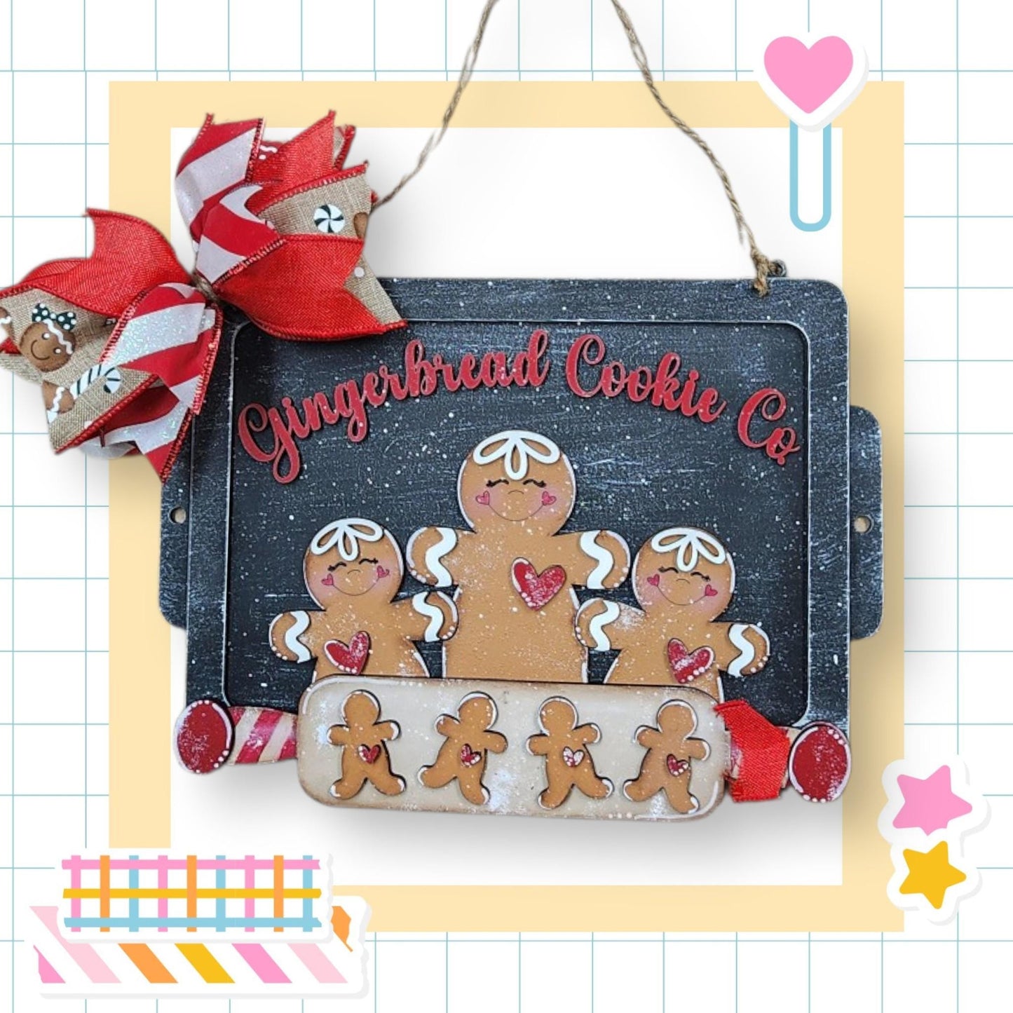 a gingerbread cookie co sign hanging on a wall