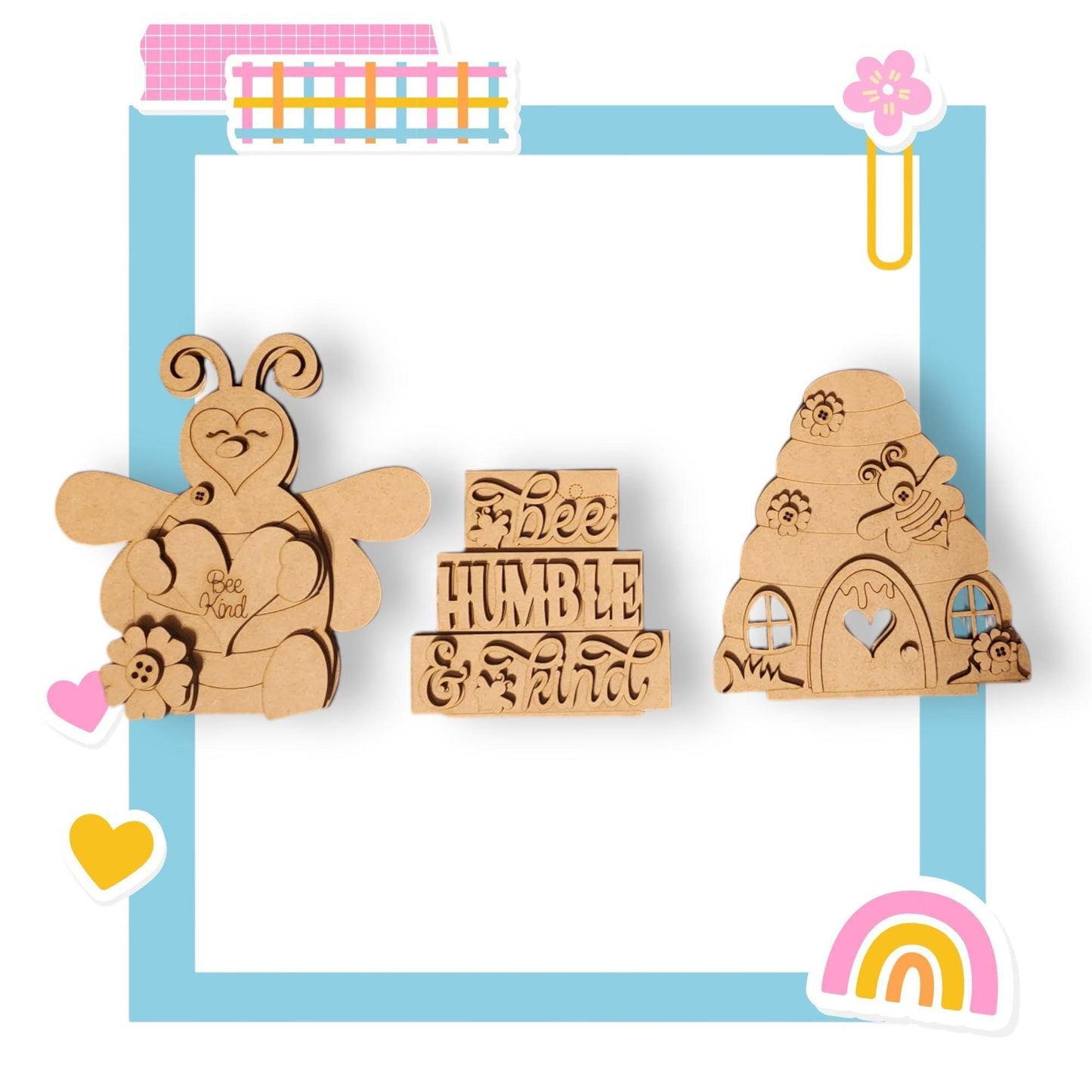 a wooden cutout of a bear and a rainbow