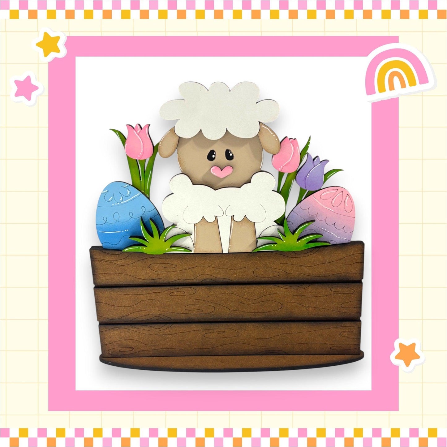 a card with a sheep sitting in a wooden box
