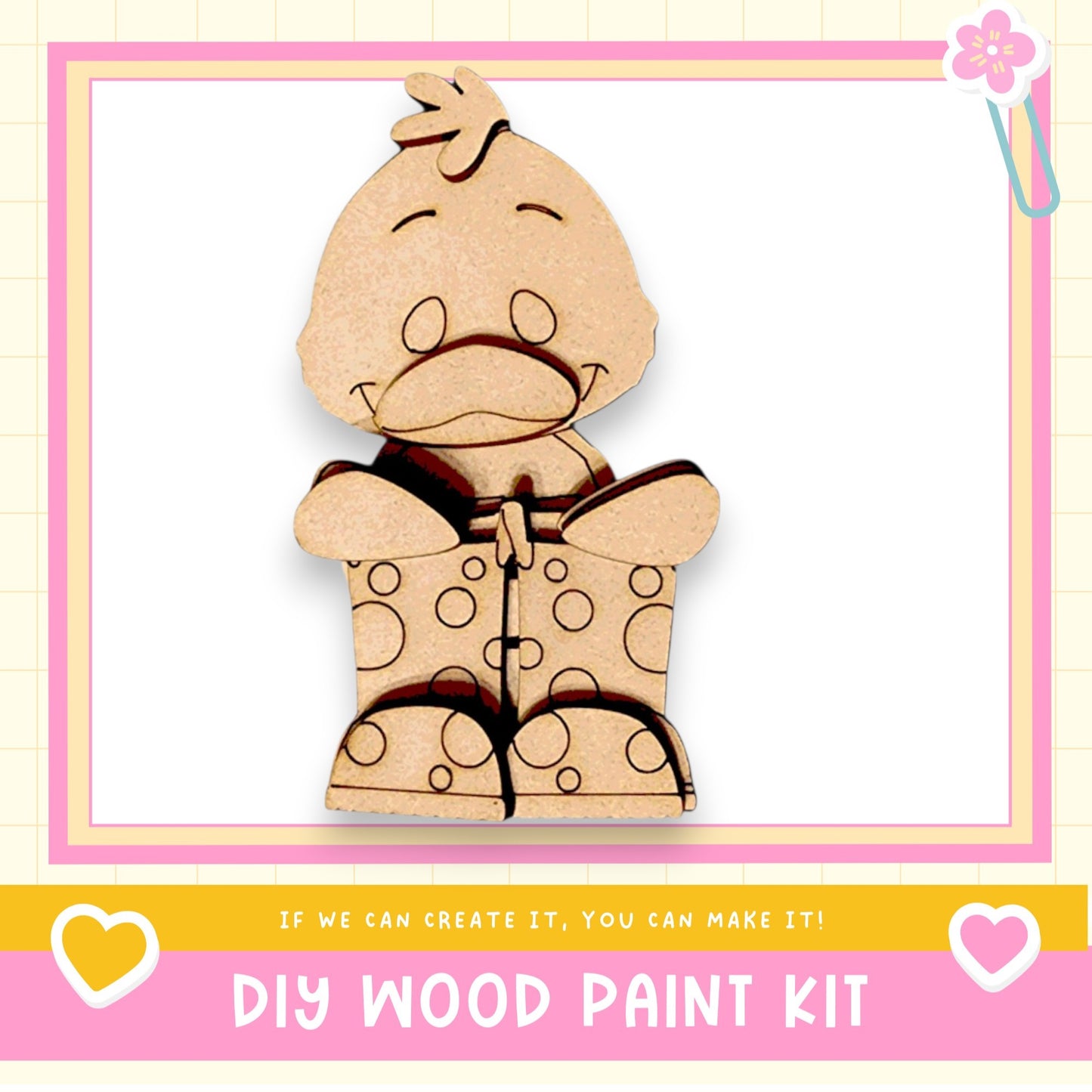 a wooden cutout of a teddy bear with polka dots