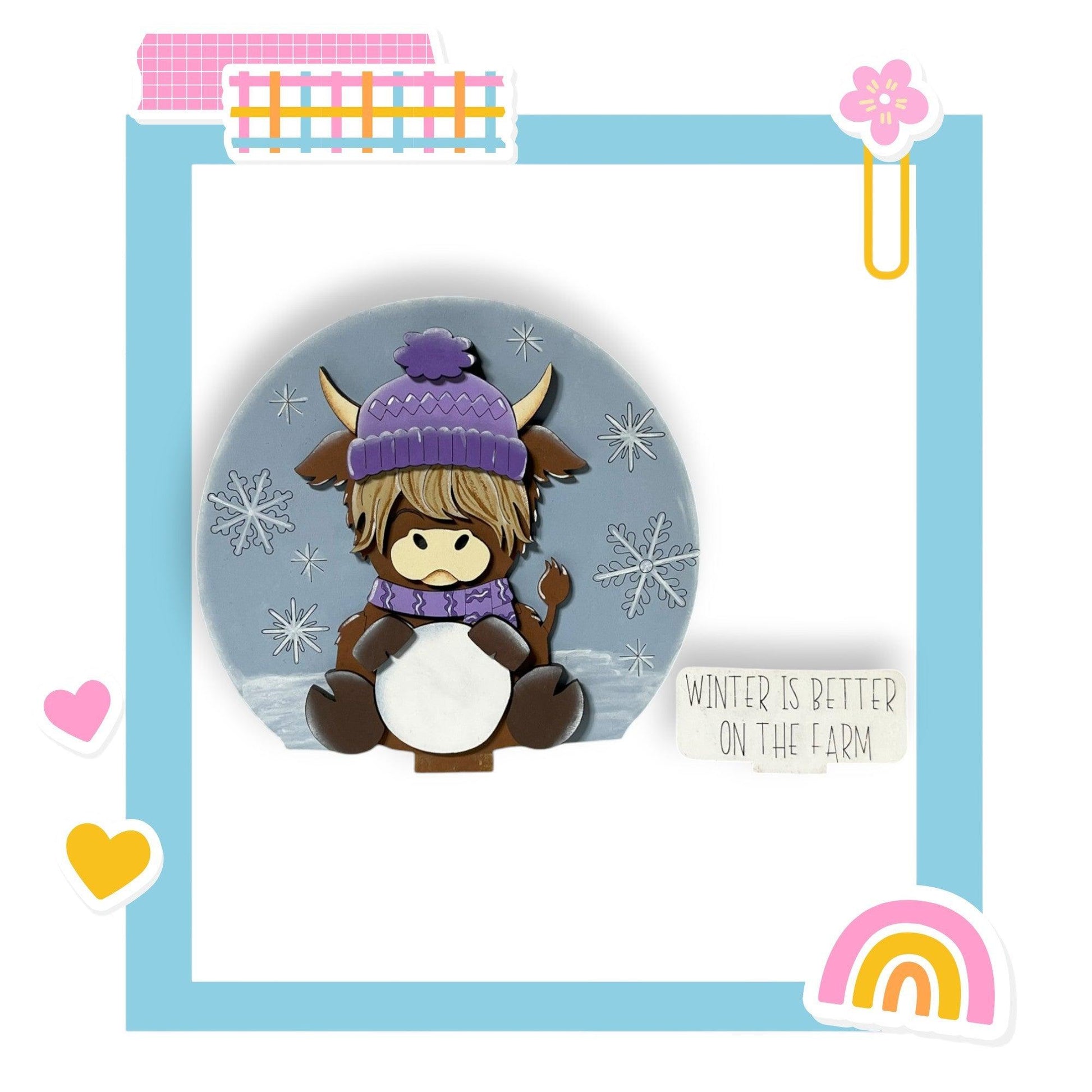 a card with a picture of a bear wearing a hat and scarf