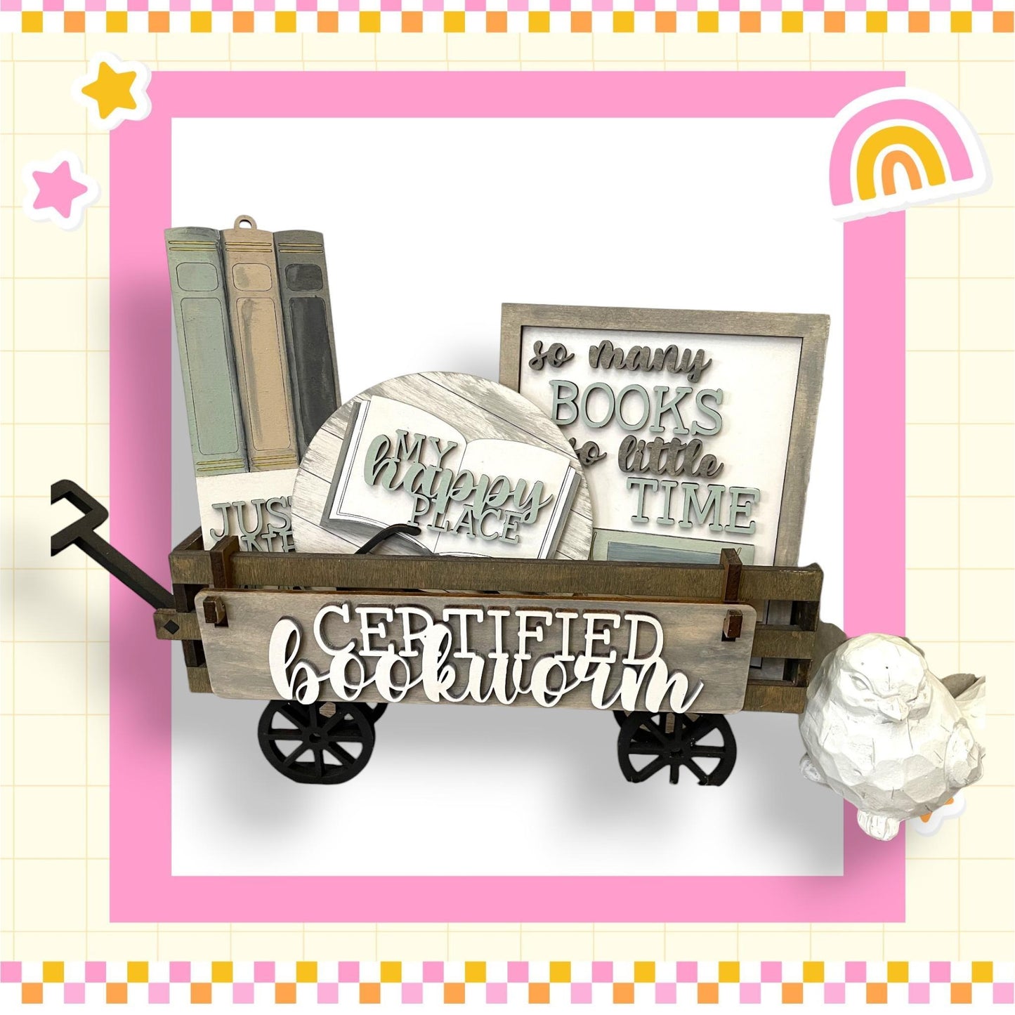 a picture of a cart with books and a teddy bear