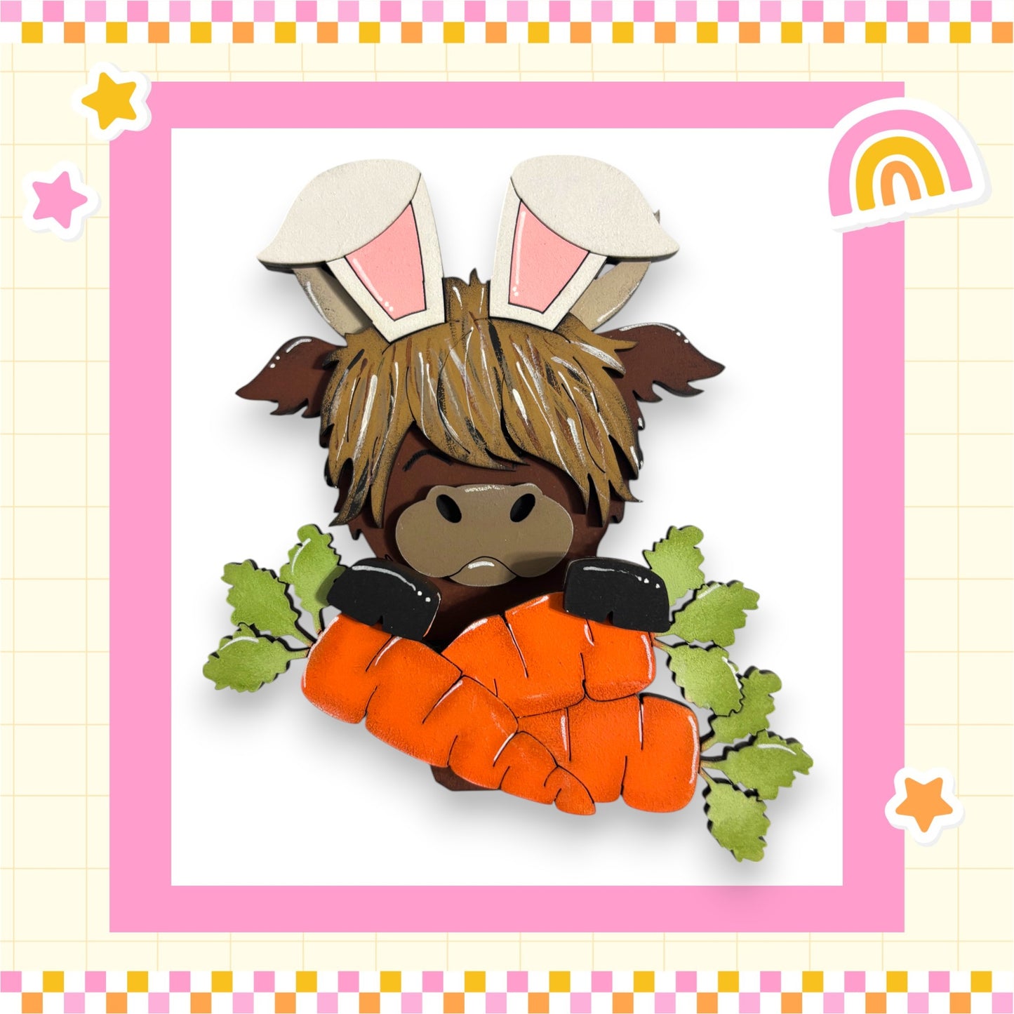 A cartoon rabbit wearing a pair of bunny ears and holding a carrot, surrounded by green leaves and a rainbow-colored border.
