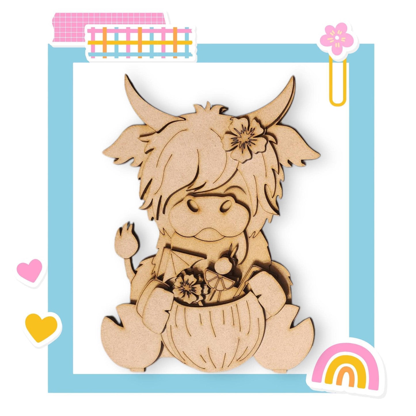 a wooden cutout of a cow with a flower in its mouth