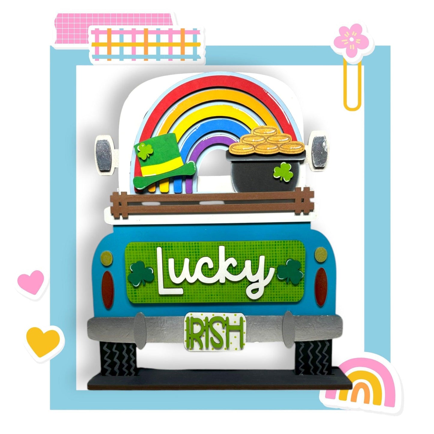 a truck with a rainbow and a pot of gold