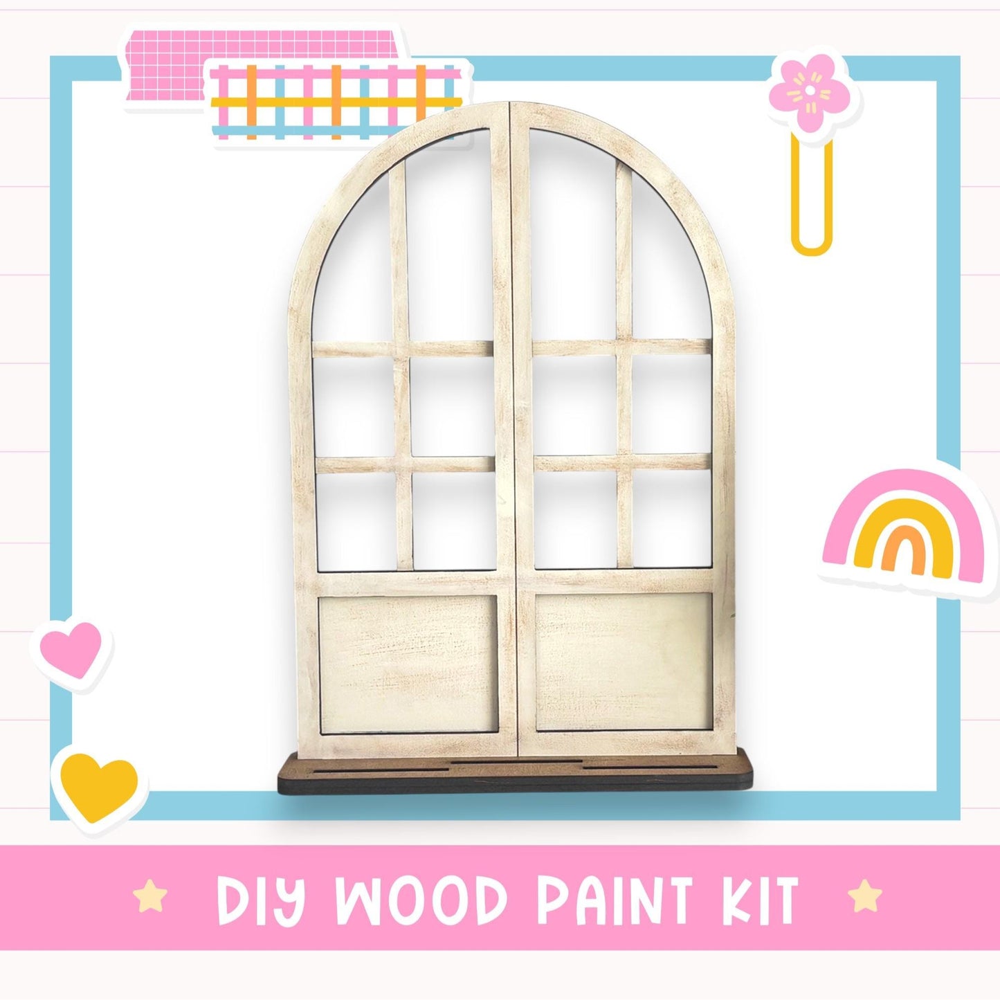 a DIY wood paint kit, including a wooden archway and various colorful stickers.