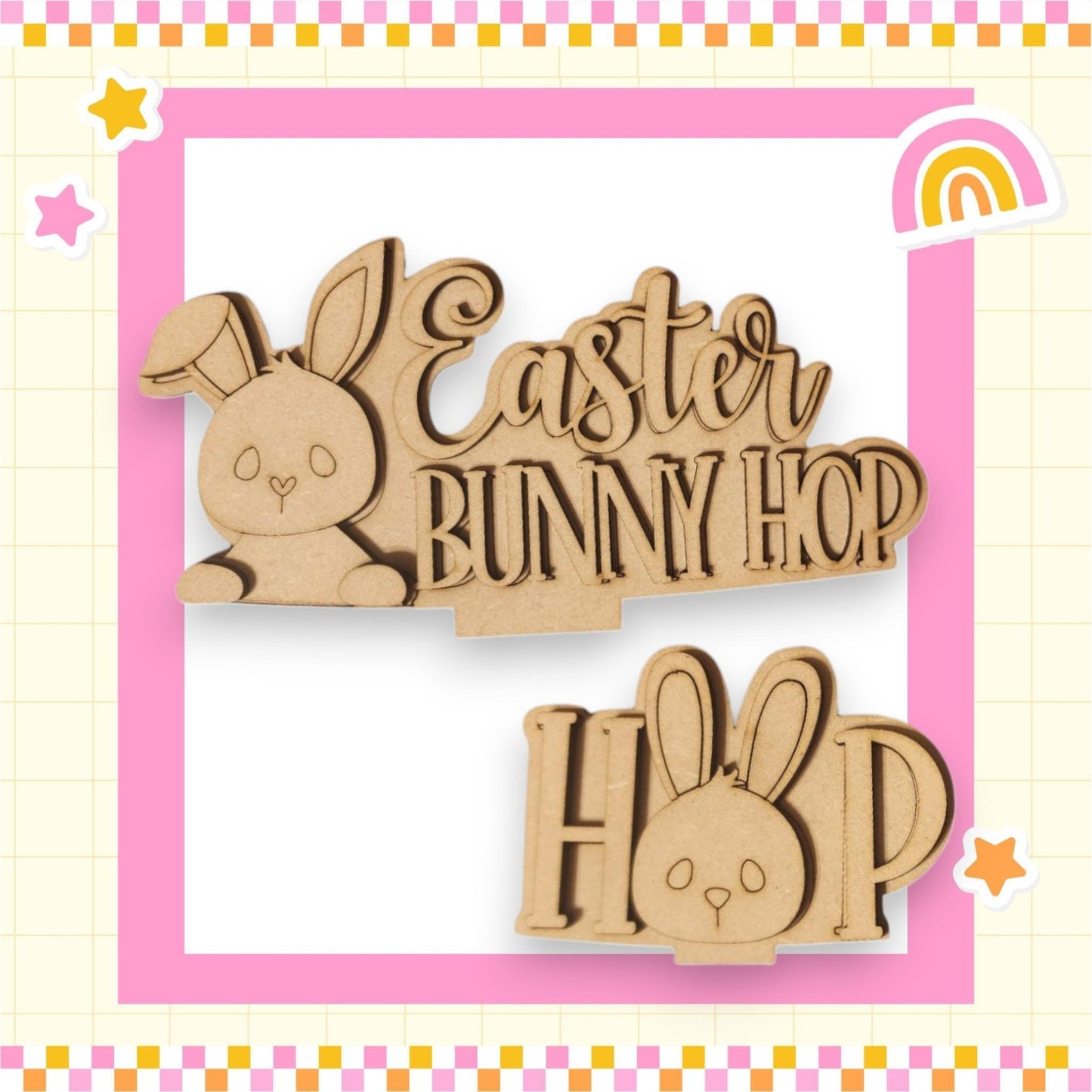 a wooden cutout of a bunny with a rainbow in the background