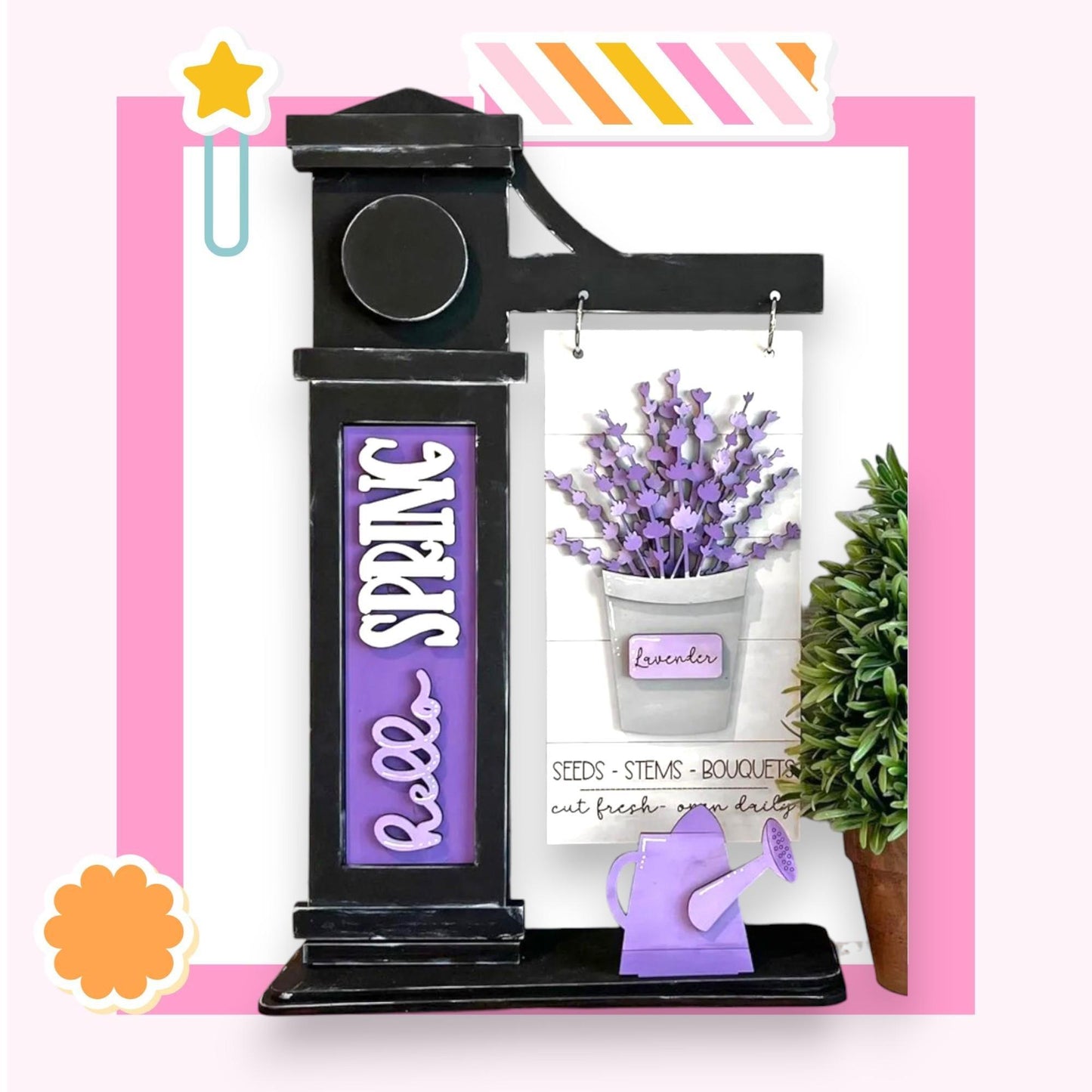 a picture of a clock with a flower pot on top of it