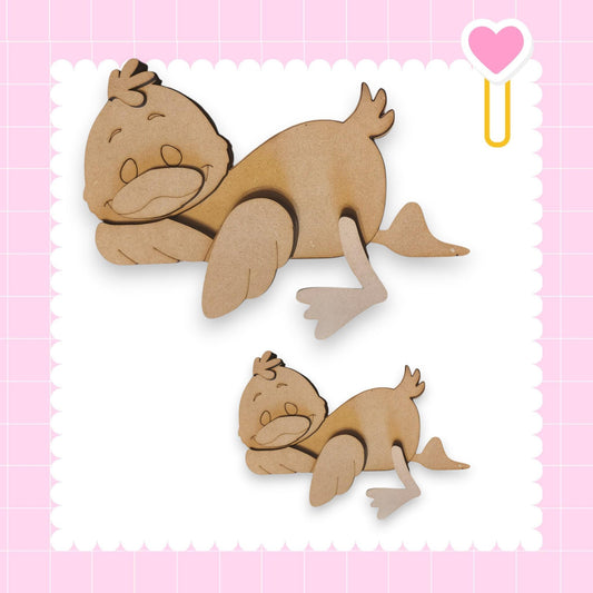 two cute wooden duck figures, one larger and one smaller, set against a pink background with a scalloped edge.