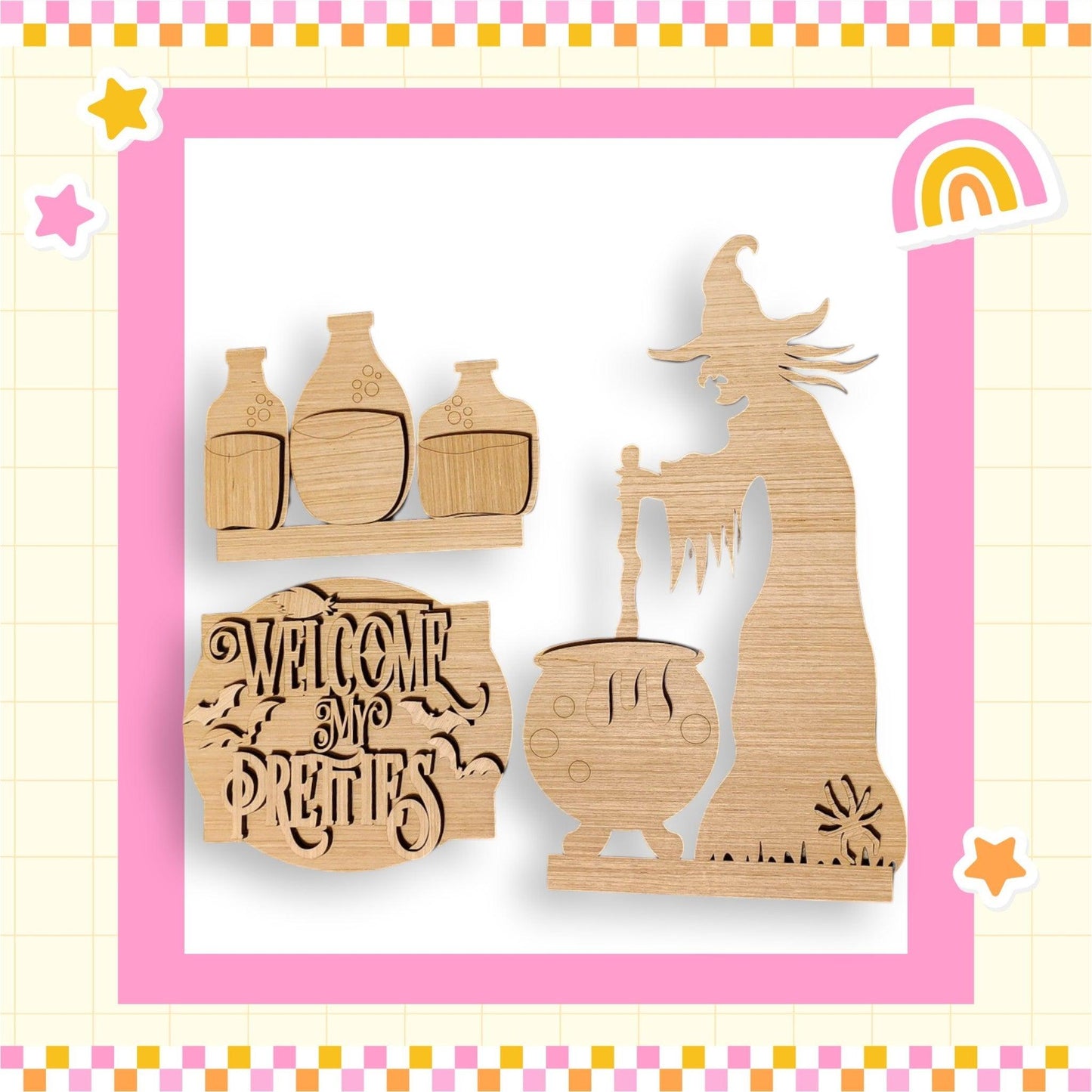 a wooden cutout of a witch and a pot with a rainbow in the background