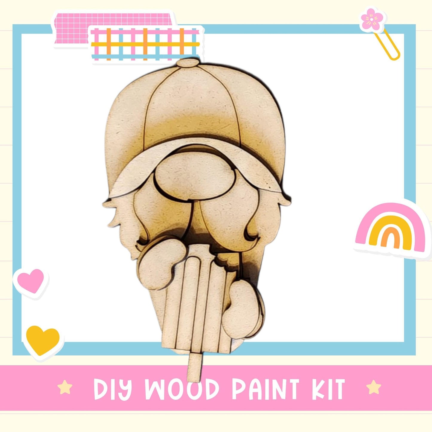 a wooden cutout of a woman's head with a rainbow in the background