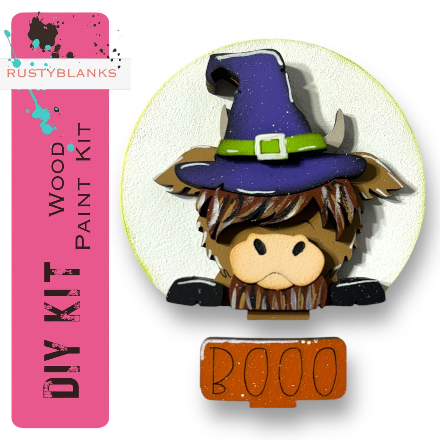 a wooden paint kit with a whimsical design of a cow wearing a witch's hat.