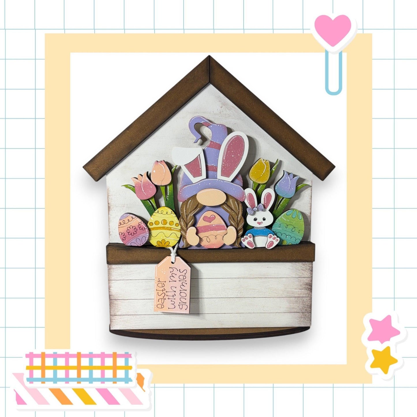 a card with a picture of a house with easter decorations