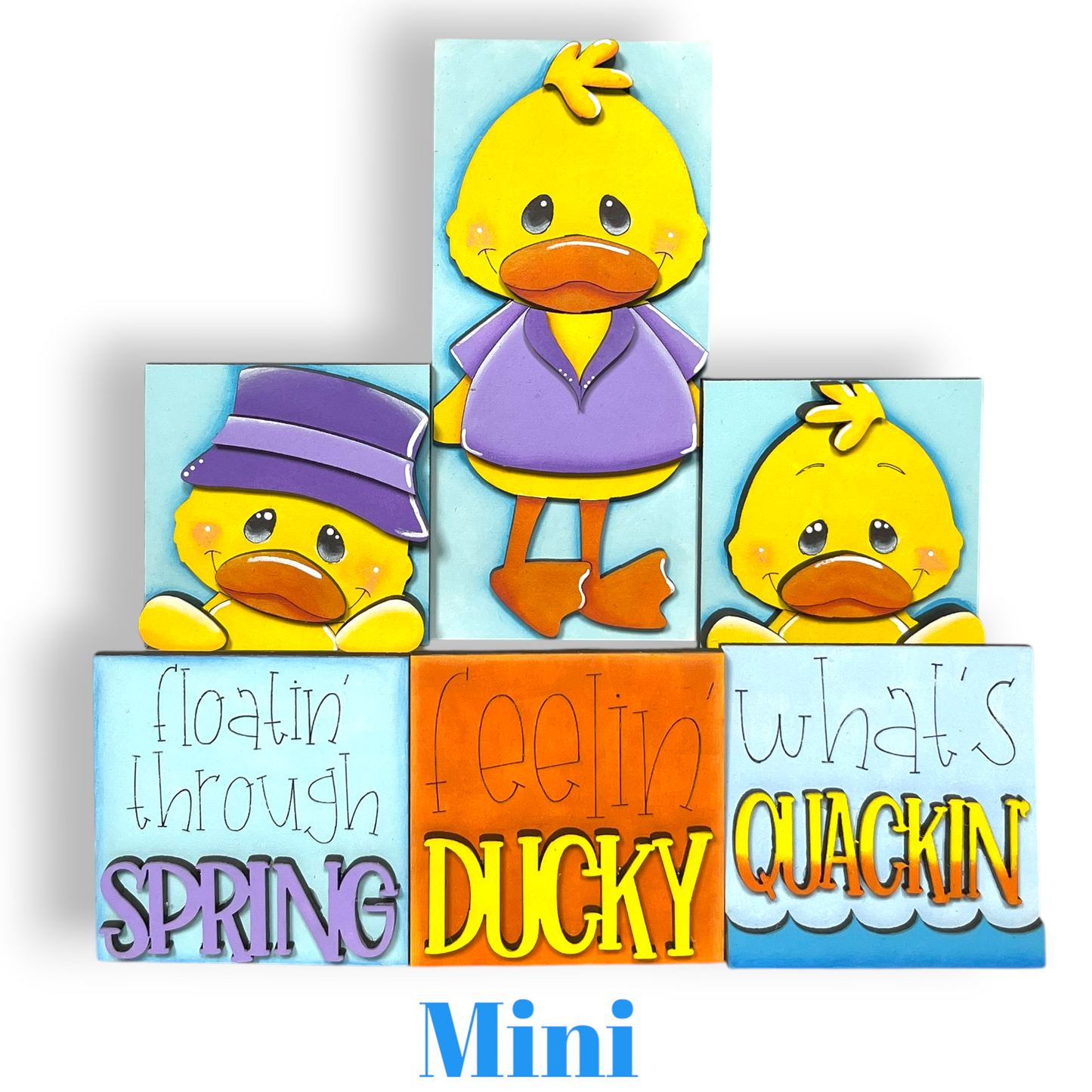 A collage of four cartoon duck images, each with a different phrase written below it, arranged in a pyramid-like structure.