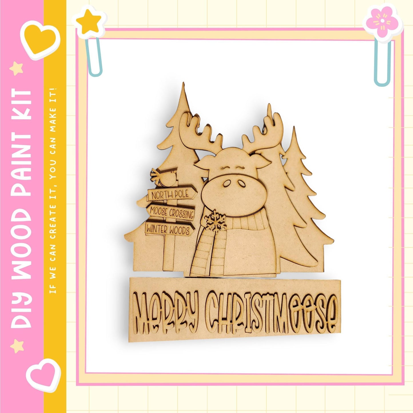 A wooden Christmas decoration with a moose and pine trees, along with the text "Merry Christmas" and "If we can create it, we can make it!"