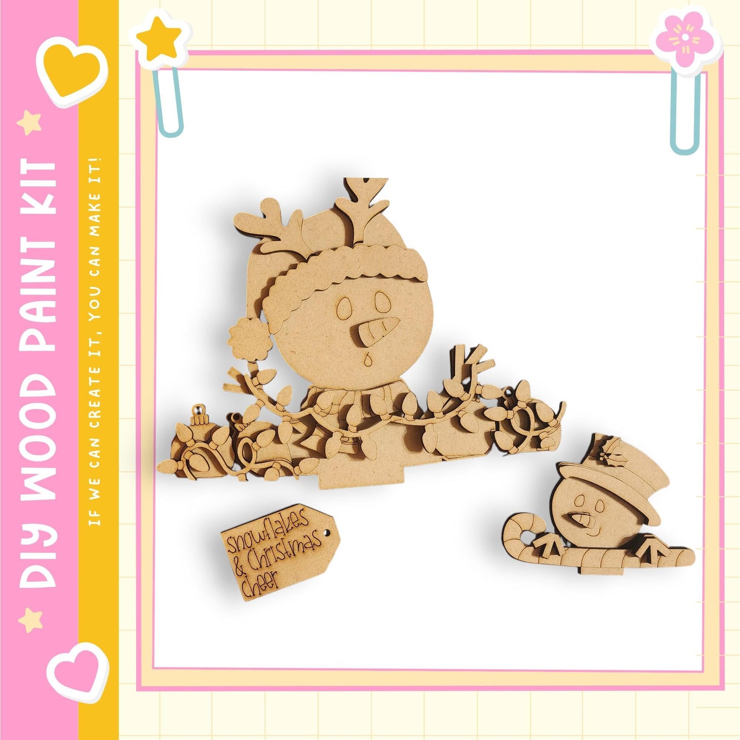 A wooden snowman kit with a snowman, reindeer, and other winter-themed decorations.