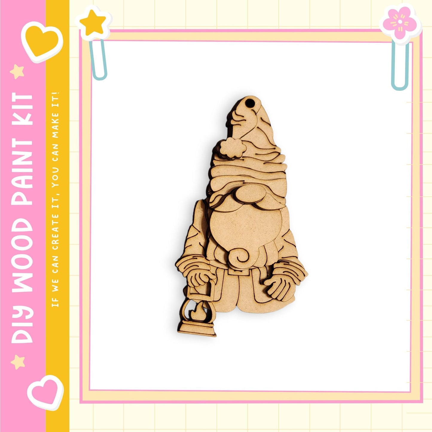 A wooden ornament in the shape of a gnome, with a lantern in its hand, is displayed against a pink and yellow background.