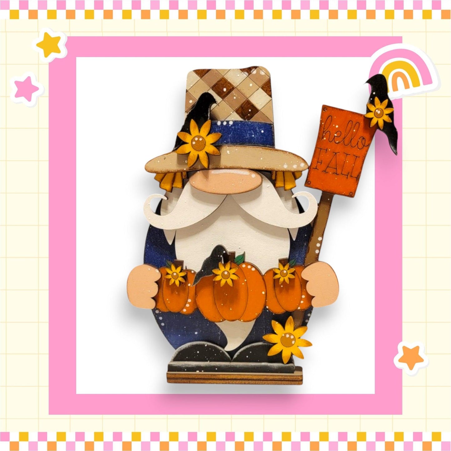 a picture of a gnome with a broom and pumpkins