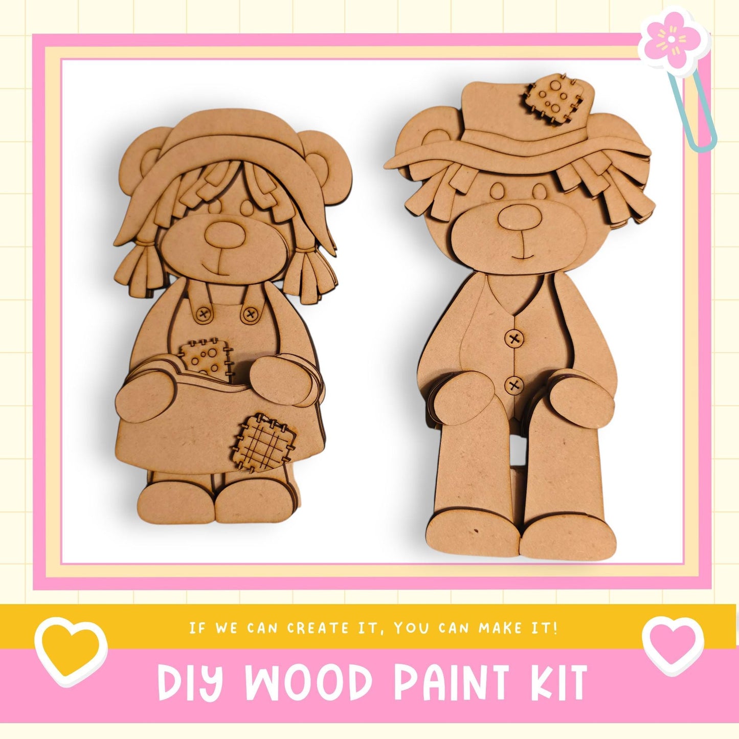 two wooden teddy bear figures, one standing and one sitting, against a pink and white background.