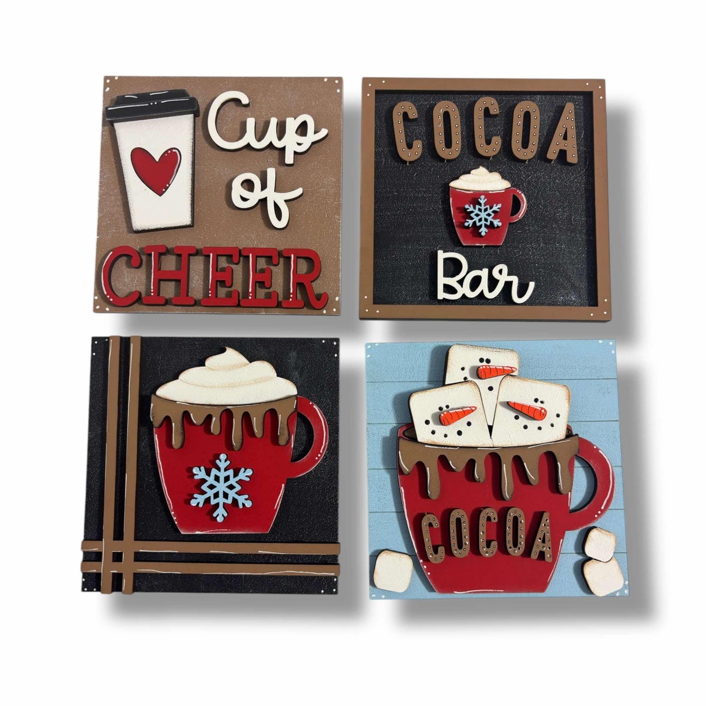 a set of four signs with different designs on them