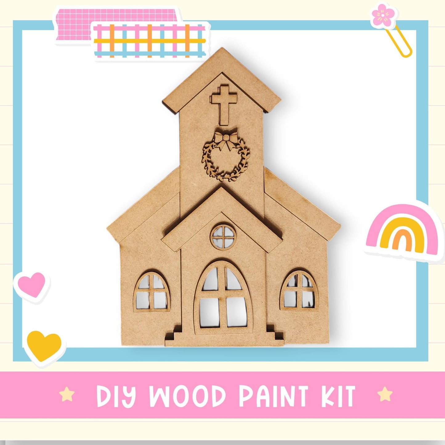 a DIY wood paint kit for creating a wooden church-like structure, with a heart and a rainbow-colored sticker on the right side.