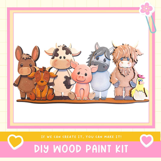 A group of five wooden animal figurines, including a cow, pig, horse, cow, and chicken, standing together in a frame.