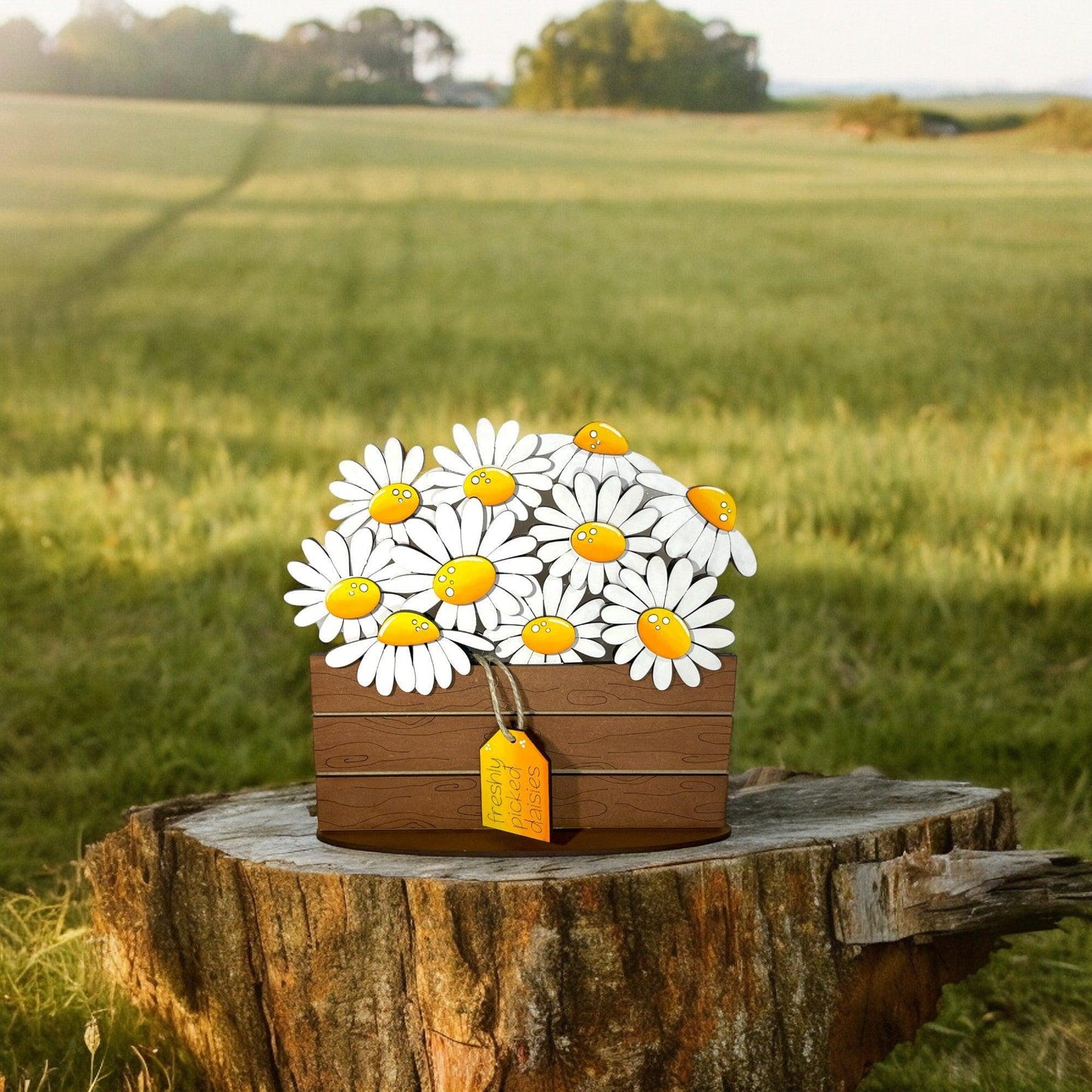 a wooden box with a bunch of daisies in it