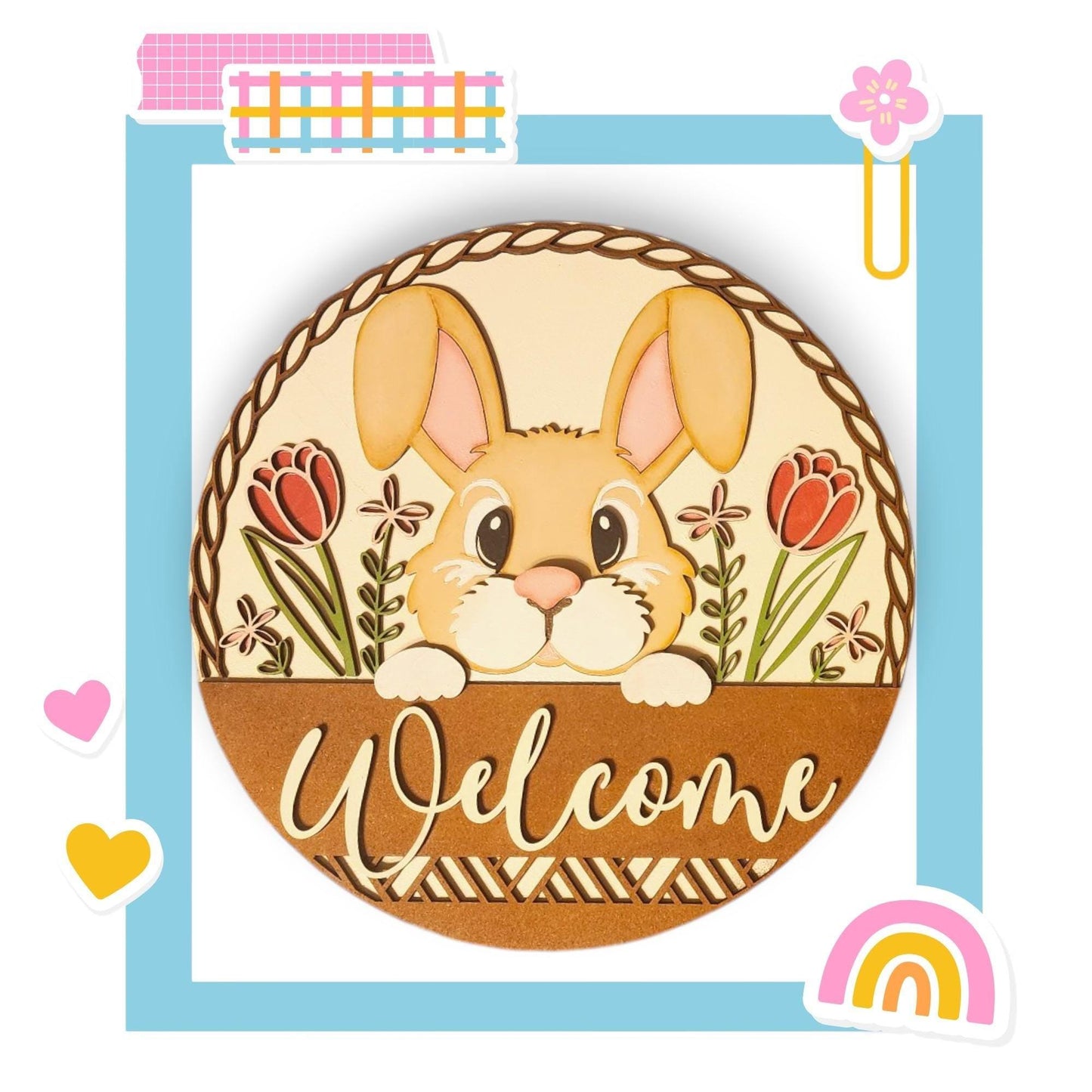 a welcome sign with a bunny in a basket