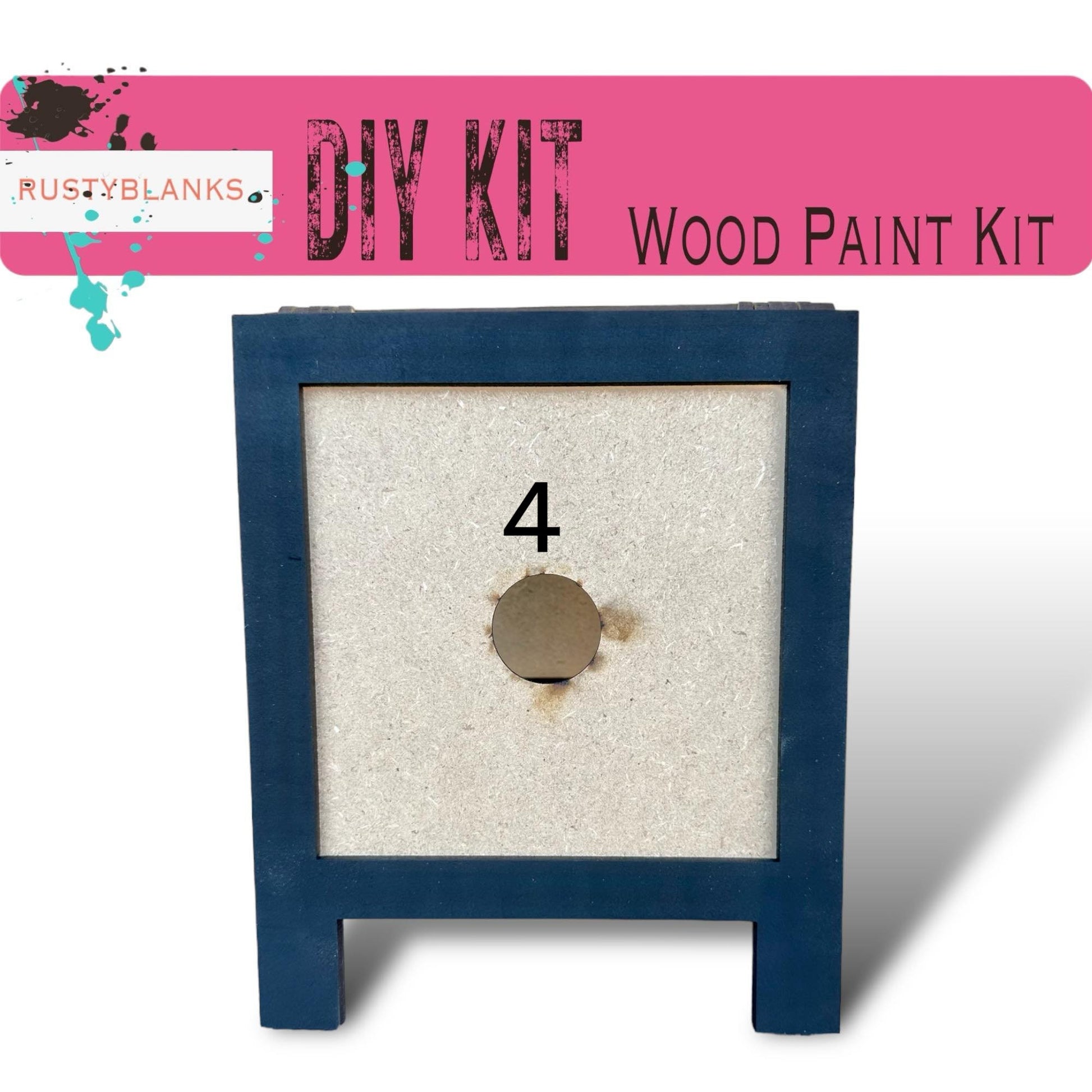 a wooden paint kit with a hole in it