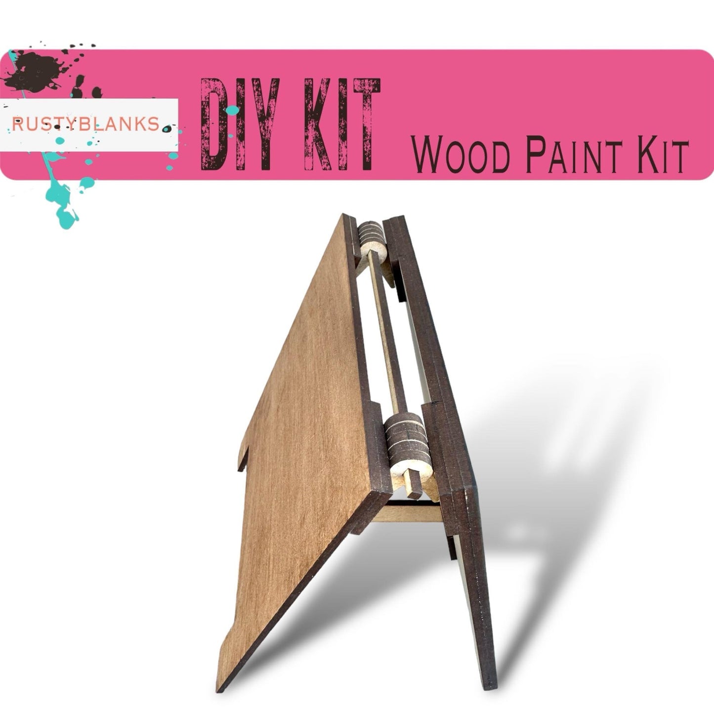 a wooden paint kit with a pink background