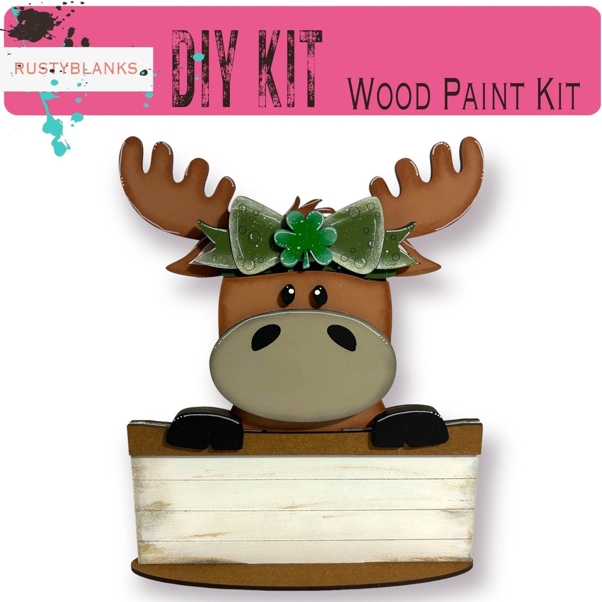 a picture of a moose with a green bow on it's head