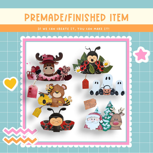 a group of stuffed animals sitting on top of a table