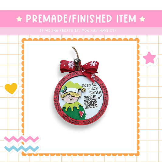 a christmas ornament with a picture of a girl on it