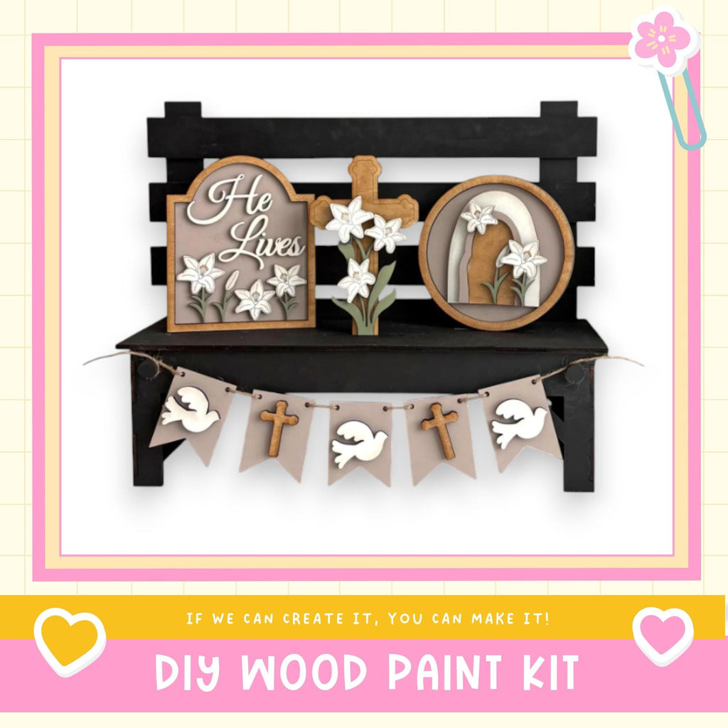 a DIY wood paint kit for creating a wooden bench with decorative elements such as a cross, flowers, and a banner.