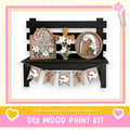 a DIY wood paint kit for creating a wooden bench with decorative elements such as a cross, flowers, and a banner.