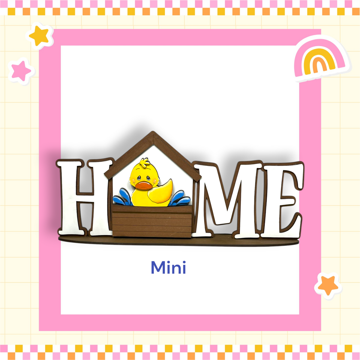 a cute yellow duck sitting inside a wooden house-shaped frame, surrounded by a pink and yellow border with stars and a rainbow.