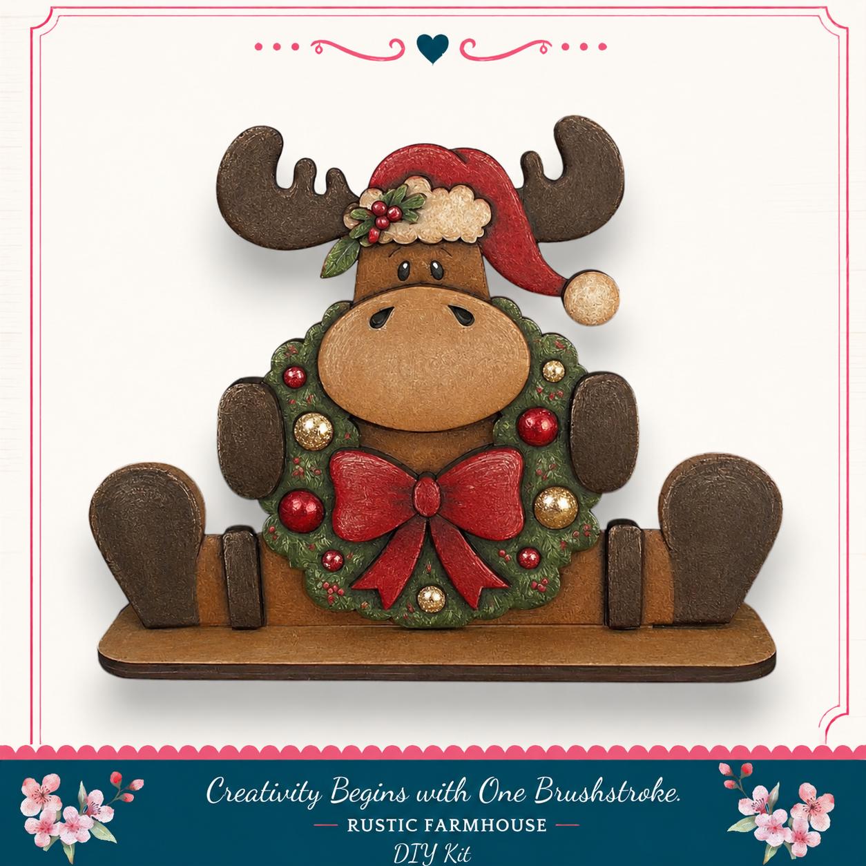 A wooden moose wearing a Christmas wreath and a Santa hat, sitting on a wooden base.