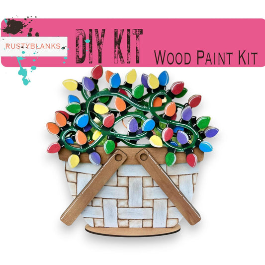 a wooden craft kit with a christmas tree in a basket