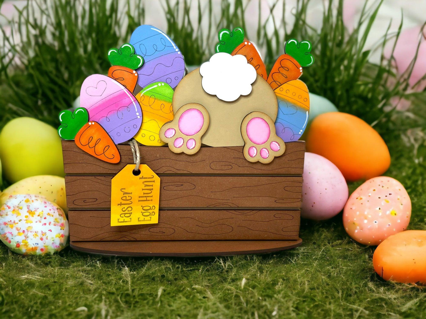 a wooden box filled with lots of colorful eggs