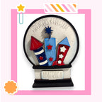 A colorful and whimsical representation of fireworks and the word "AMERICA" in a decorative frame.
