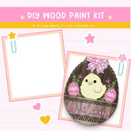 a card with a picture of a chick in a basket