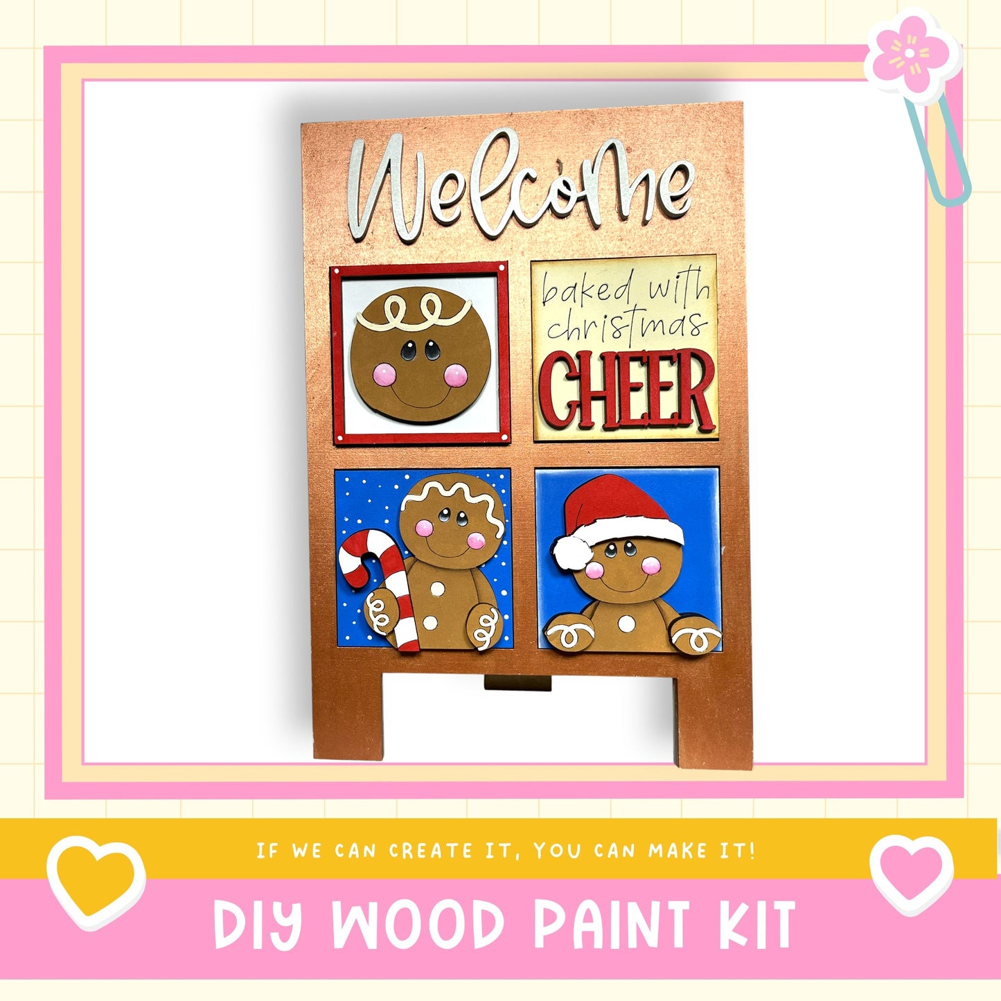 The image is a DIY wood paint kit featuring a welcome sign with gingerbread man and a cheer sign, along with a heart and a flower.
