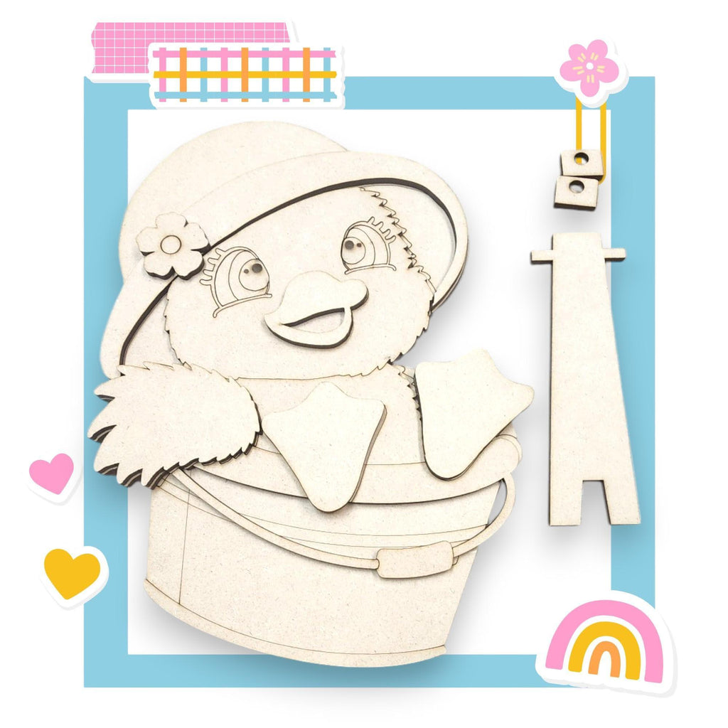 a wooden cutout of a bear in a bucket